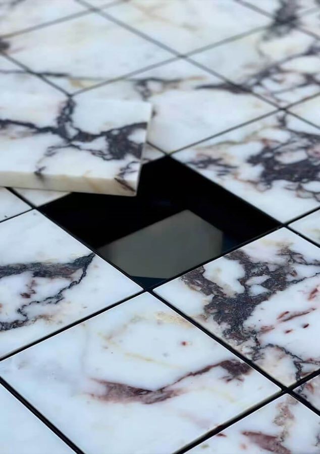 Calacatta viola marble tiles close up